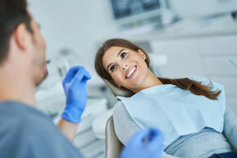 Dentist and patient in a private dental office consultation